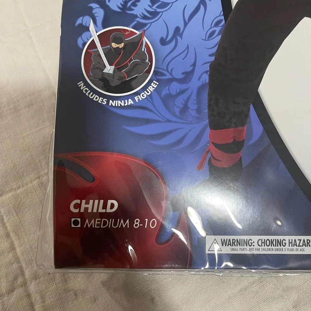 Stealth ninja jumpsuit with attached hood and tie size medium 8-10